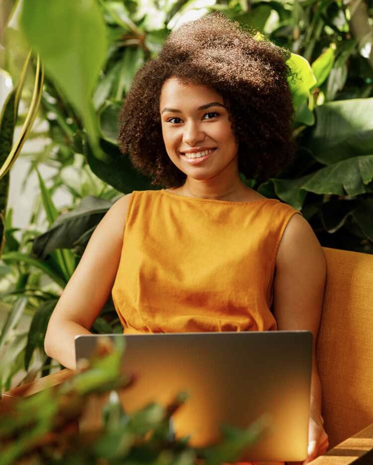 happy woman with laptop